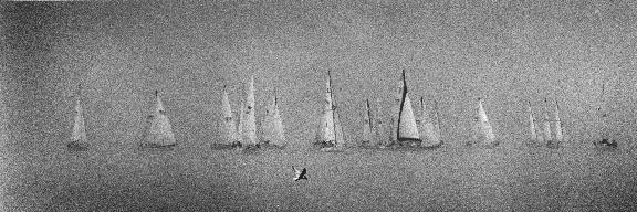 sailboats in the fog on Lake Michigan
